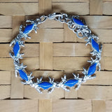 Crab link bracelet in surgical steel with blue enameled shells