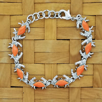 Crab link bracelet in surgical steel with orange enameled shells