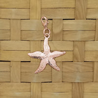 Starfish charm closeup - surgical steel and copper plated with lobster claw clasp